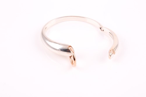 Lot 329 - Mont Blanc. A silver and rose gold bangle and...