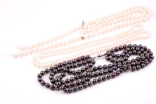 Lot 361 - An opera length fresh water pearl necklace, of...