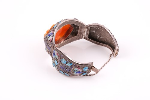 Lot 76 - A white metal, amber, and enamel bracelet,...