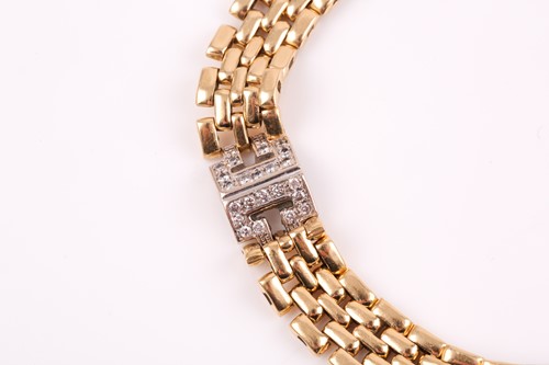 Lot 2 - An 18ct yellow gold and diamond bracelet, the...