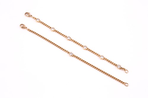 Lot 168 - An 18ct yellow gold and diamond bracelet, the...