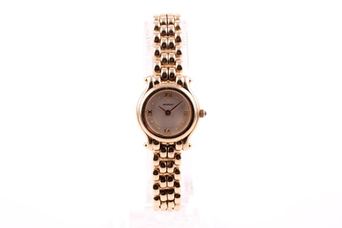 Lot 172 - A ladies yellow metal Movado watch, the round...
