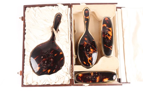 Lot 580 - A tortoiseshell & silver gilt five piece...