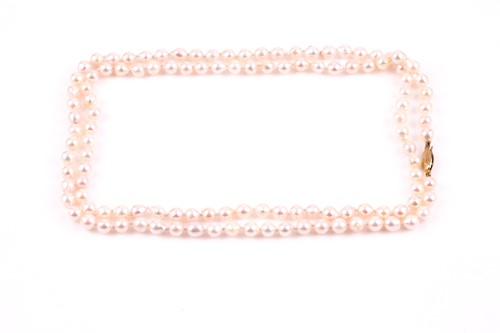 Lot 484 - A cultured pearl opera length necklace,...