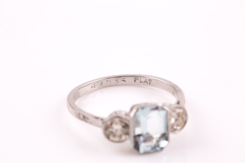 Lot 220 - A diamond, aquamarine, and platinum ring, set...