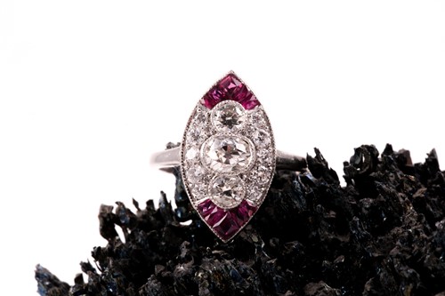 Lot 434 - A platinum, diamond, and ruby ring, in the Art...