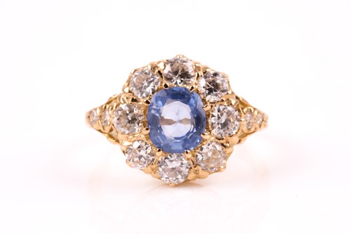 Lot 270 - An 18ct yellow gold, diamond, and sapphire...