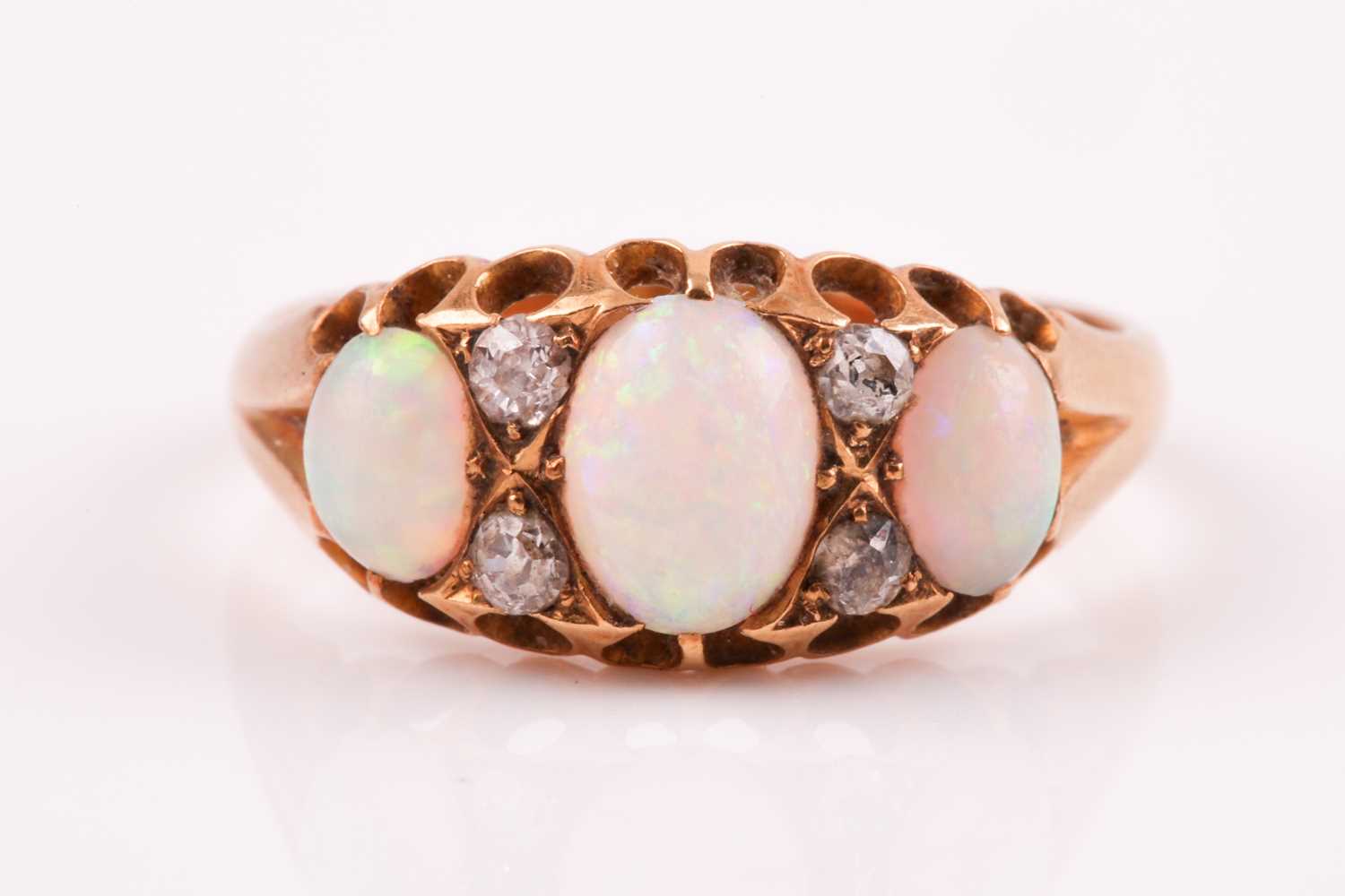 Lot 255 - An Edwardian seven stone opal and diamond half...