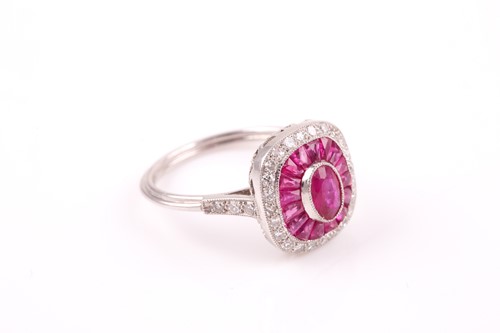 Lot 237 - A diamond and ruby dress ring, centred with a...