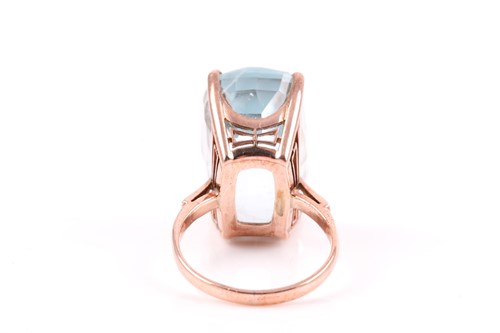 Lot 495 - An 18ct rose gold and blue topaz cocktail ring,...