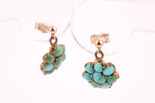 Lot 262 - A pair of yellow metal and turquoise floral...
