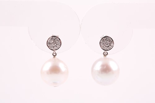 Lot 234 - A pair of diamond and pearl drop earrings,...