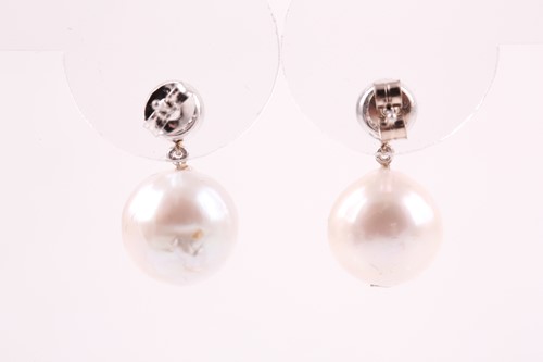 Lot 234 - A pair of diamond and pearl drop earrings,...