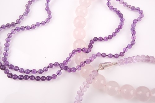 Lot 69 - A rose quartz beaded necklace, the beads...