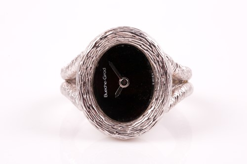 Lot 379 - An unusual 18ct white gold watch-ring by...