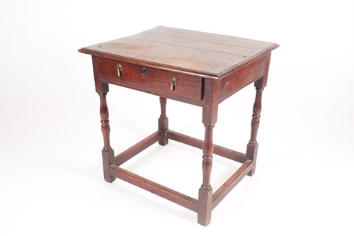 Lot 171 - A late 18th-century oak side table. With...