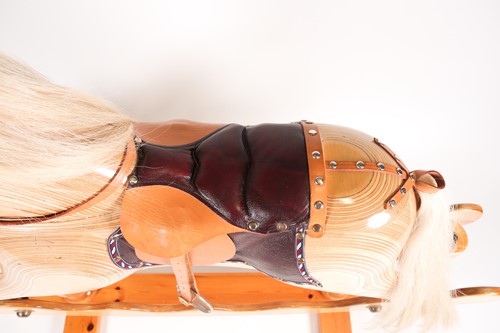 Lot 63 - A laminated pine rocking horse, by Ian...