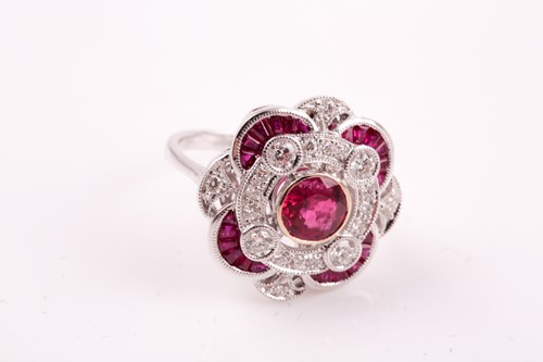 Lot 284 - A Belle Epoque style ruby and diamond foliate...