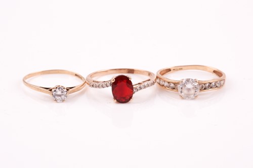 Lot 369 - A single stone garnet ring, with diamond set...