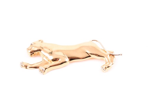 Lot 461 - A Cartier-style stylised panther brooch; with...