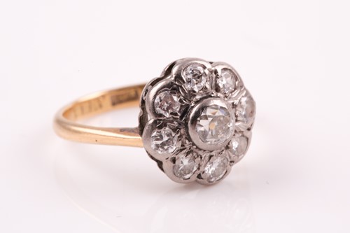 Lot 259 - A diamond cluster ring, the central old...