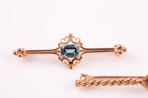Lot 236 - A single stone 9ct gold and blue topaz bar...