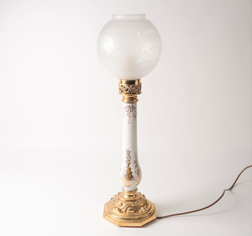 Lot 298 - A 19th style gilded milk glass table lamp of...