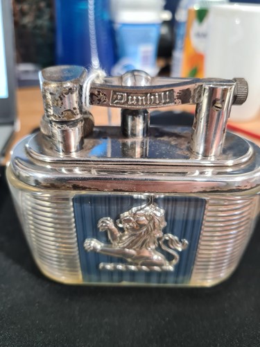 Lot 383 - A Lucas Dunhill silver plated table lighter,...