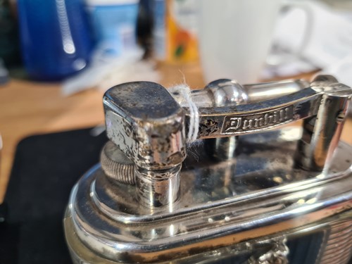 Lot 383 - A Lucas Dunhill silver plated table lighter,...