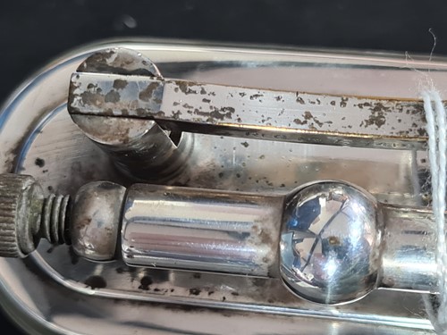 Lot 383 - A Lucas Dunhill silver plated table lighter,...