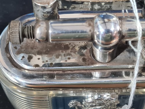Lot 383 - A Lucas Dunhill silver plated table lighter,...