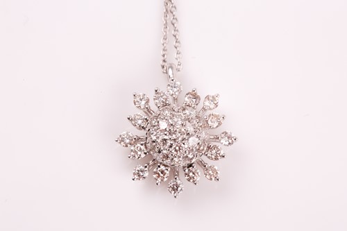 Lot 343 - A diamond cluster pendant; the bombe centre...