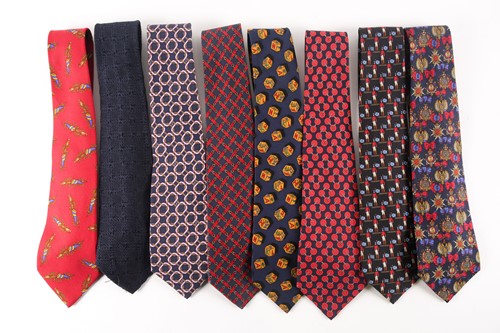 Lot 524 - A collection of eight Chanel ties of varying...