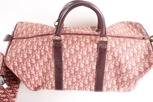 Lot 523 - A vintage Christian Dior travel bag, with...
