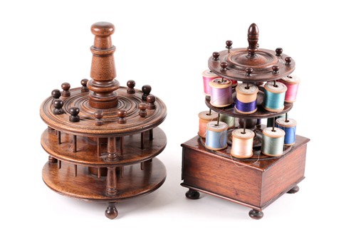 Lot 322 - A Victorian figured rosewood cotton reel stand...