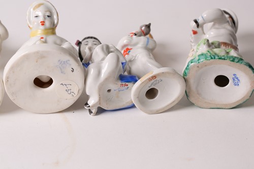 Lot 455 - A Lomonosov Soviet Russian porcelain figure of...