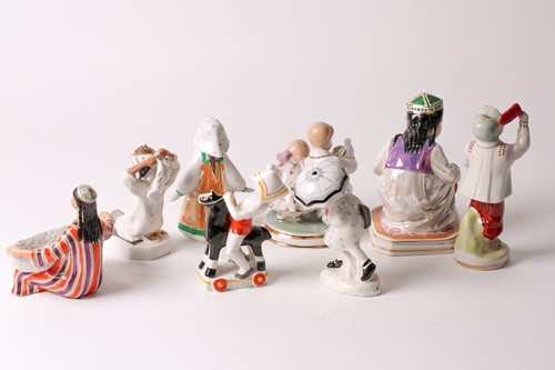 Lot 456 - A Dulevo Soviet Russian porcelain figure of an...