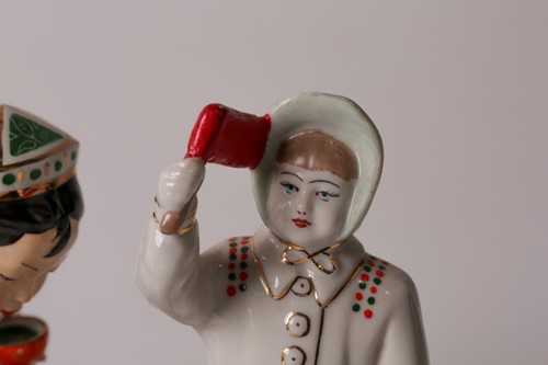 Lot 456 - A Dulevo Soviet Russian porcelain figure of an...