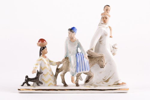 Lot 467 - A Soviet Russian porcelain figure group of an...