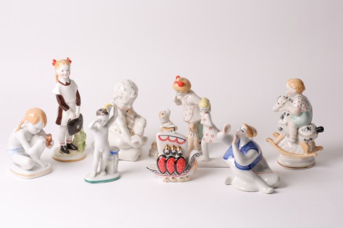 Lot 468 - A Lomonosov Soviet Russian porcelain figure of...