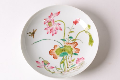 Lot 159 - A Chinese famille rose saucer dish, painted...