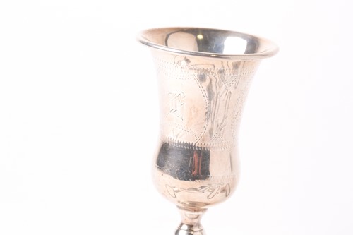 Lot 503 - A set of seven silver and blue enamel decanter...