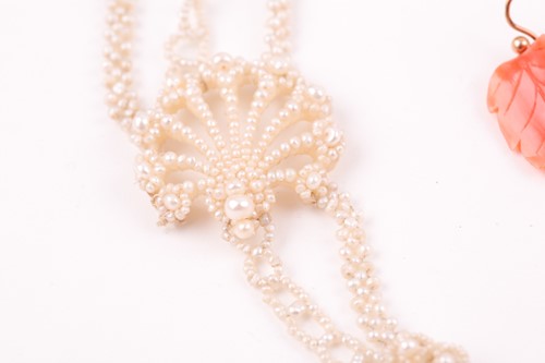 Lot 149 - An Edwardian seed pearl necklace, suspended...