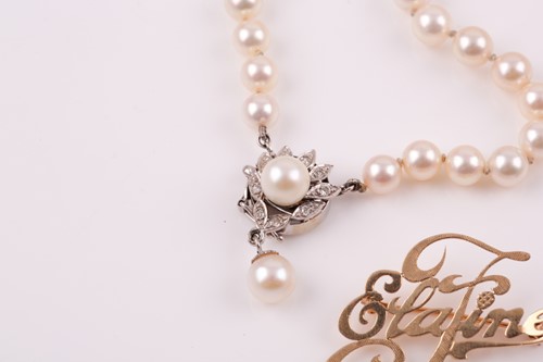 Lot 199 - A cultured pearl necklace, suspended with a...