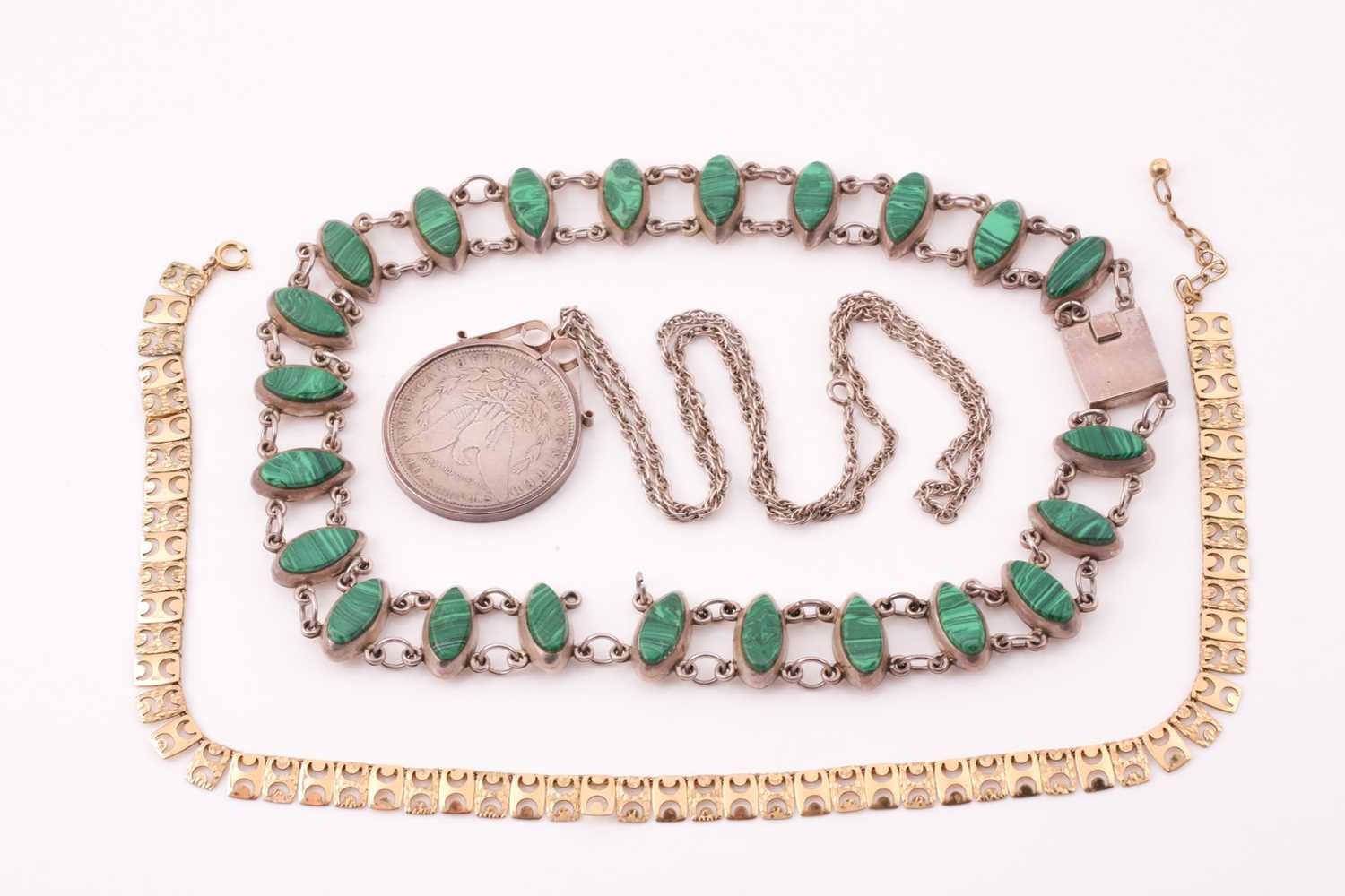 Lot 35 - A gilt metal necklace comprising of pierced...