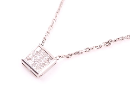 Lot 307 - A 9ct white gold and diamond pendant, the...