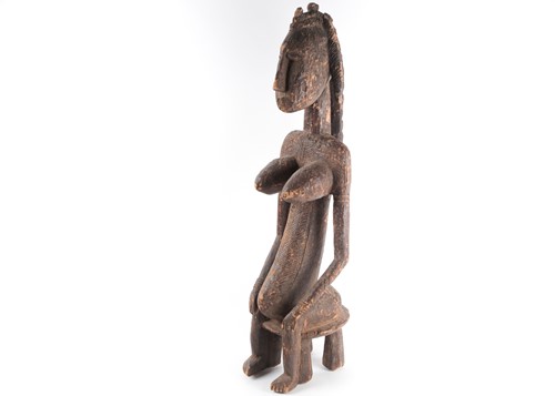 Lot 170 - A large Dogon seated female figure, Mali, in...