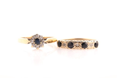 Lot 252 - A sapphire and clear stone cluster ring in 9ct...