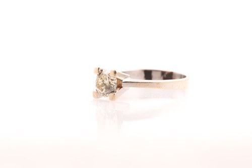 Lot 108 - A single stone diamond ring, the round...