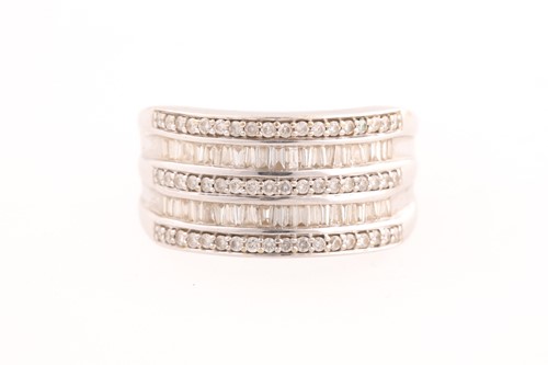 Lot 280 - A five band diamond set dress ring; the...